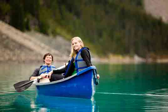 Quebec's Active Lifestyle Woman and man kayaking 