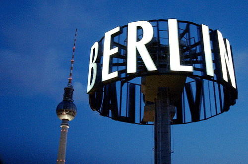 Berlin sign with church in back
