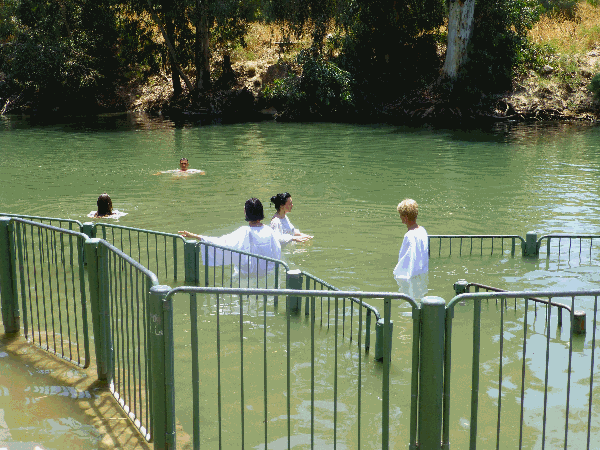 Pilgrims bathe in River Jordan,Yardenit Baptismal Center Photo by Monique Burns