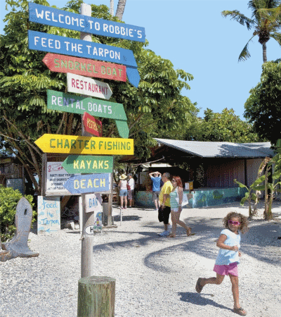 Signboards at the entrance to Robbie's Marina in Islamorada Florida