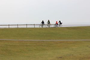 Cyclists on the Dike in Nordeney, Germany