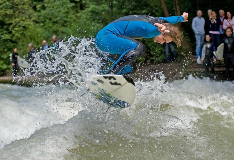 Surfer at the Eisbach in the English Garden, another Munich experience on TravelSquire