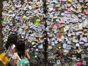 Love notes board in Juliet's Courtyard on TravelSquire