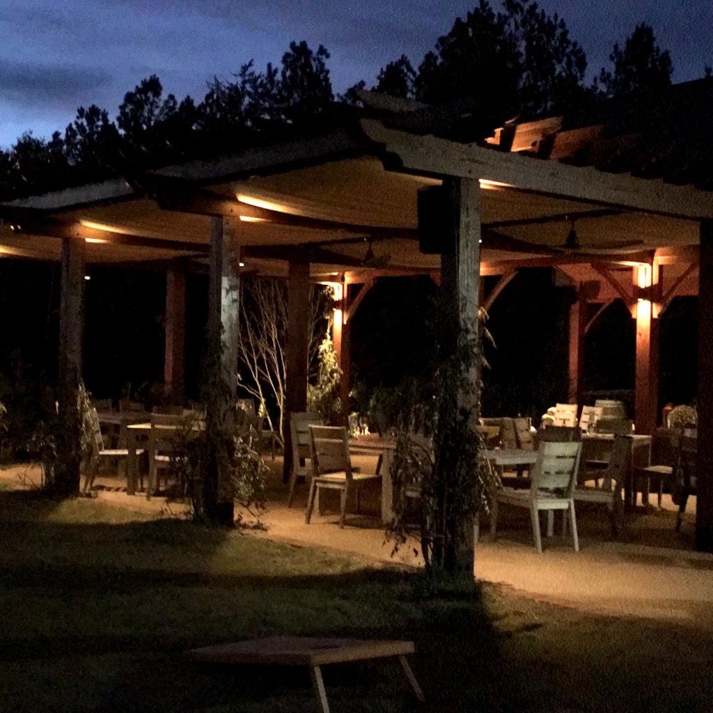 Asheville Mountain Brook Vineyard covered patio with fireplace and live