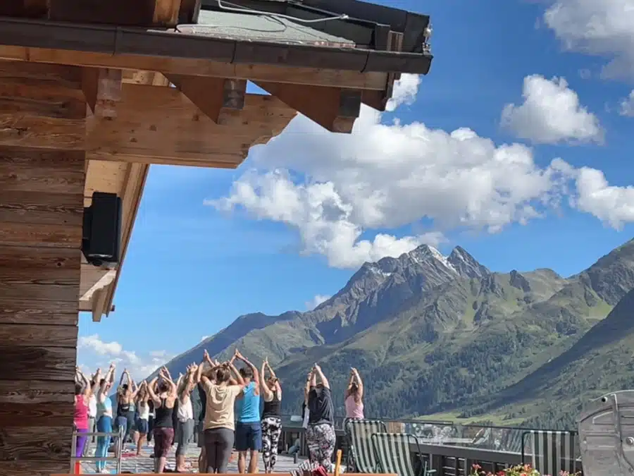 Yoga-on-terrace-overlooking-Alps