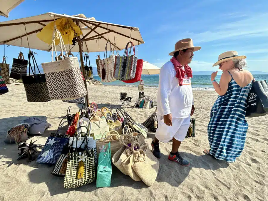 Beach vendors steps from Velas Vallartas La Ribera restaurant