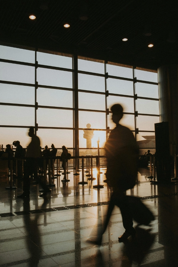 Silhouettes of people at the airport