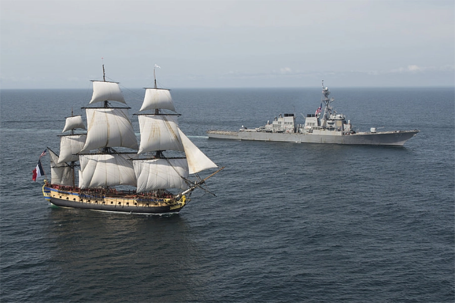 Tall ships with military vessel