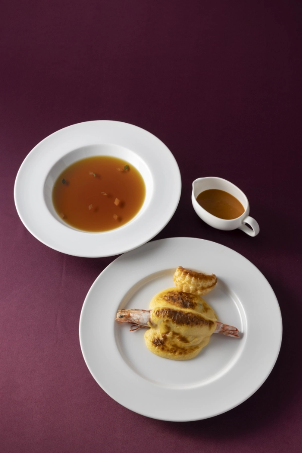 Consommé Soup and Gratin of Prawn and Sole Queen Elizabeth II